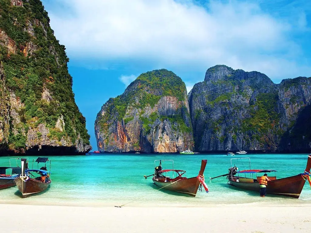From Phuket: Phi Phi Islands, Maya Bay & Khai Nok Tour — turquoise water and limestone cliffs of Maya Bay, Phi Phi (photo 1)